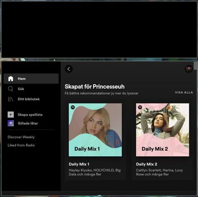 The normal spotify window, running under Wayland but also, an entirely black screen running under X11